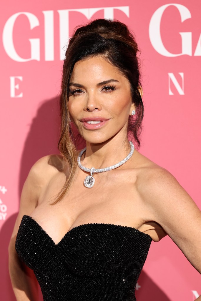 Lauren Sánchez attending the Global Gift Gala in a black strapless dress and a diamond necklace.