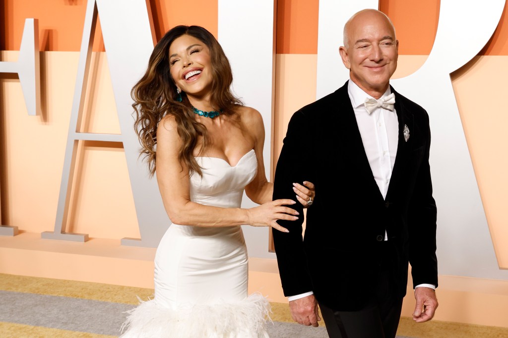 Lauren Sanchez and Jeff Bezos attending the 2025 Vanity Fair Oscar Party.